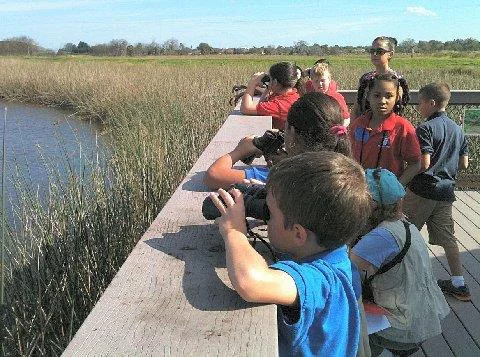 CF Explorers - on railing Kids using binoculars image
