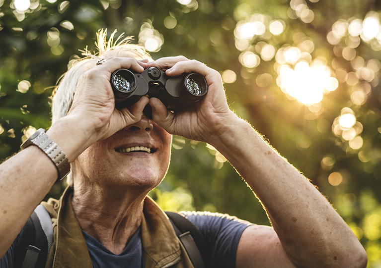 Person using binoculars image